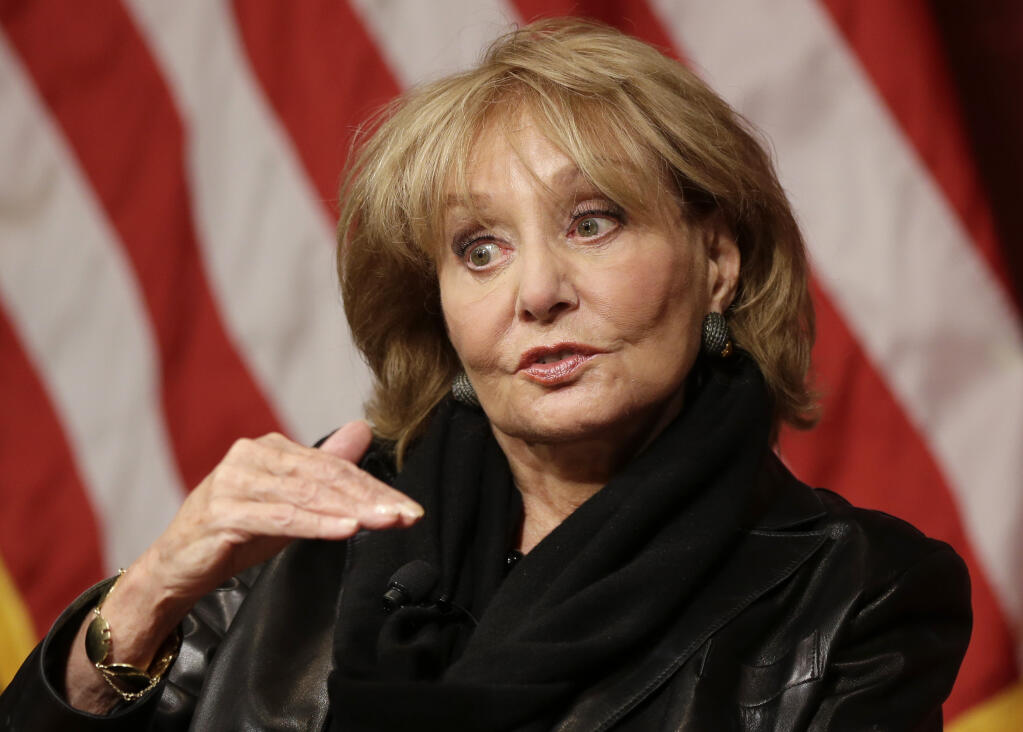 FILE - In this Oct. 7, 2014 file photo, Barbara Walters addresses an audience at the John F. Kennedy School of Government on the campus of Harvard University in Cambridge, Mass. (AP Photo/Steven Senne, File)