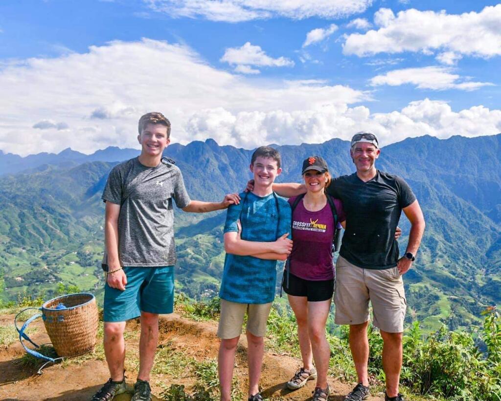 Carmen Sinigiani of Sebastopol and her husband, Brian, are pictured with their sons, Anthony, 15, and Joey, 14, in Vietnam. The family currently is stranded in Peru during the coronavirus pandemic. (The Sinigiani family)