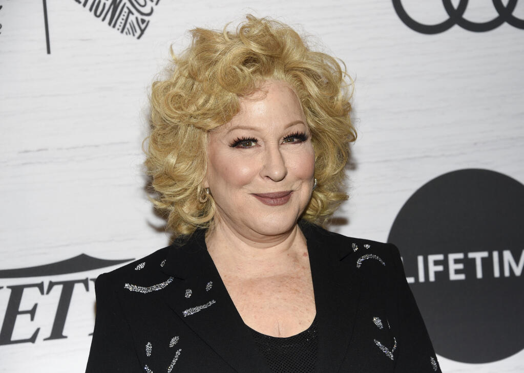 FILE - In this April 5, 2019, file photo Bette Midler attends Variety's Power of Women: New York in New York. The Kennedy Center Honors is returning in December with a class that includes Motown Records creator Berry Gordy, “Saturday Night Live” mastermind Lorne Michaels and actress-singer Bette Midler. Organizers expect to operate at full capacity, after last year’s Honors ceremony was delayed for months and later conducted under intense COVID-19 restrictions. (Photo by Evan Agostini/Invision/AP, File)