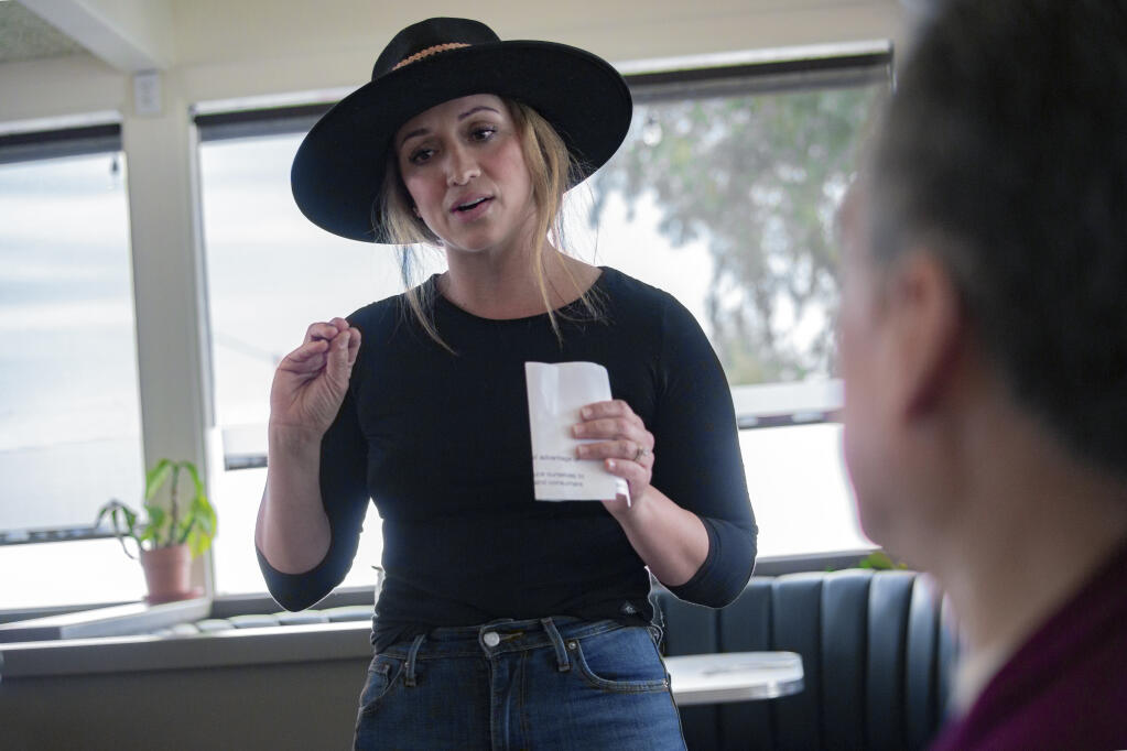Kina Chavez, proprietor of Kina’s Kitchen and Bar on Highway 12 in the Springs, explains the nature of her family’s recipes on Wednesday, March 30, 2022. (Robbi Pengelly/Index-Tribune)