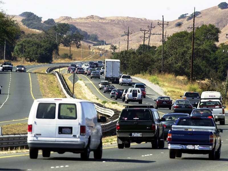 Traffic moves on Highway 101 through the Sonoma-Marin Narrows north of Novato. (The Press Democrat)