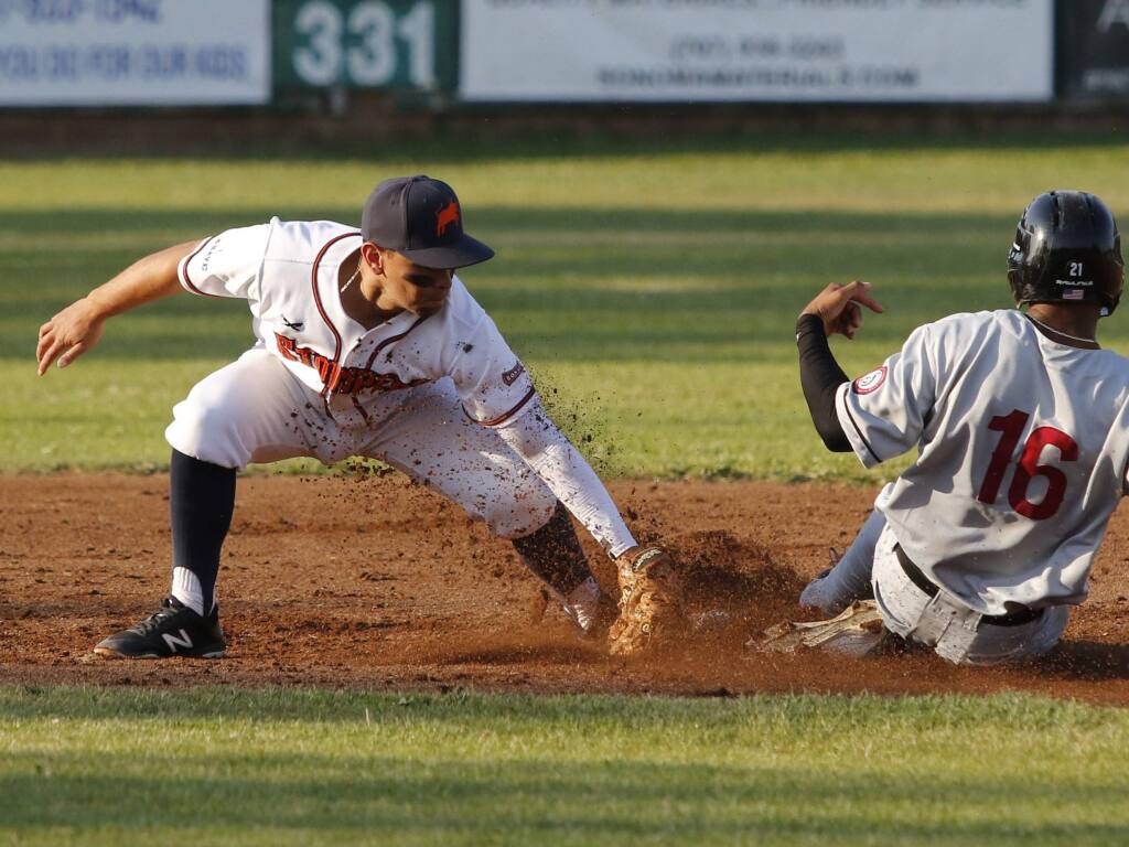 Eddie Mora-Loera puts the tag on a Napa runner in a 2018 Sonoma Stompers  game. Mora-Loera has just been named team general manager, and the Stompers will join the statewide California Collegiate League for the 2022 season. (Bill Hoban/Index-Tribune)