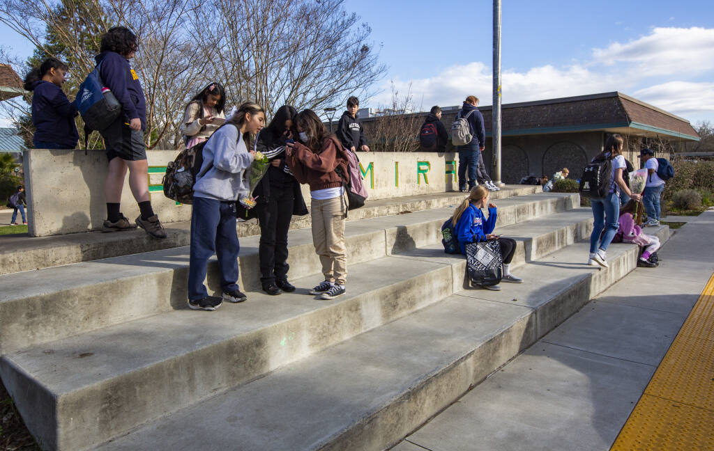 Altimira Middle School students wait for their rides home after classes on Tuesday, Feb. 14. The Sonoma Valley Unified School District Board of Trustees is considering several options to reduce declining enrollment, including consolidating Altimira and Adele Harrison middle schools beginning in the 2023-24 academic year. (Robbi Pengelly/Index-Tribune)