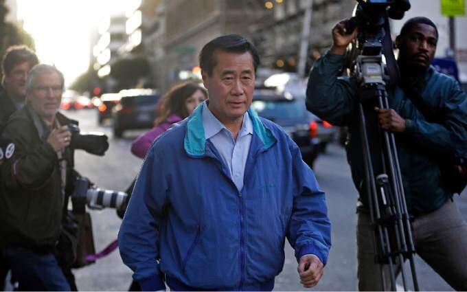 California Sen. Leland Yee, D-San Francisco, right, is accused in a sweeping organized crime and public corruption case centered in Chinatown. On Friday, July 27, he was also charged with racketeering. (AP Photo/Ben Margot, file)