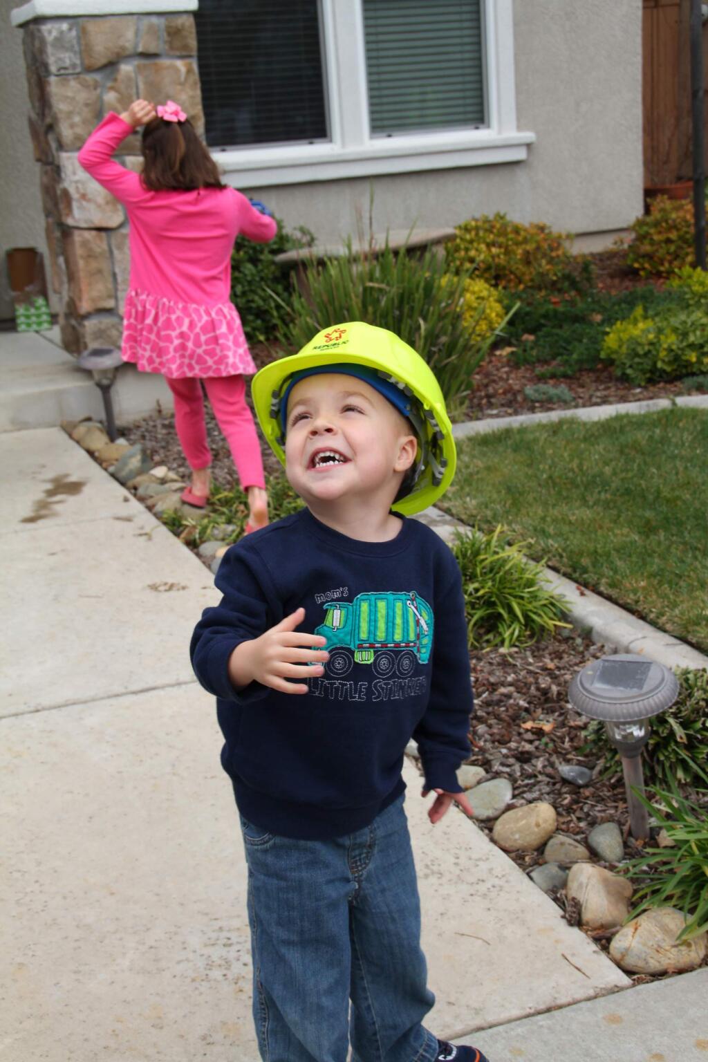 This February 2014 photo taken by Arnell Elegue and provided by the Make A Wish Foundation shows Ethan Dean in Rancho Cordova, Calif. Dean, 6, who has cystic fibrosis, will have his dream to be a garbage man come true with help of the Make-A-Wish Foundation. Dean will ride along on a garbage truck collecting trash at various locations in Sacramento, Calif., Tuesday, July 26, 2016. (Arnell Elegue/Make A Wish Foundation via AP)