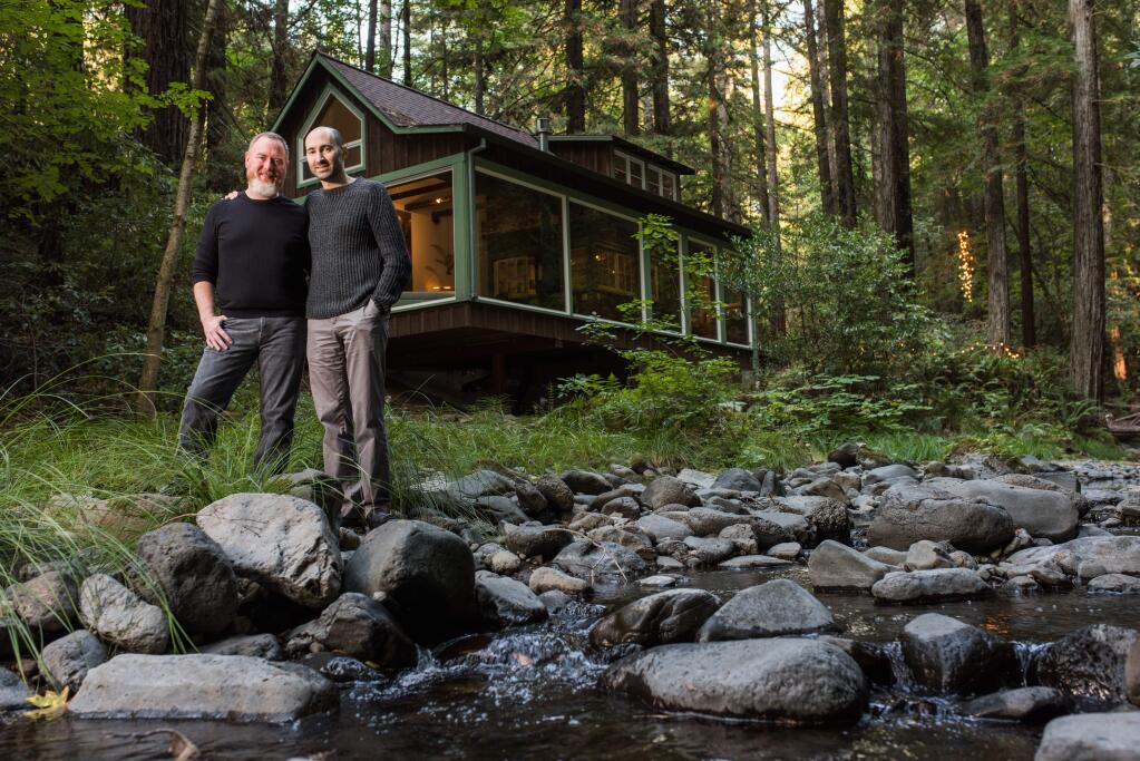 Homeowners Josh Feldman, right, and Britton Watkins played key roles in the redesign of their vintage cabin retreat. (Rebecca Chotkowski)