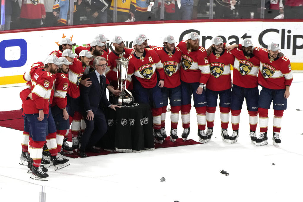 The Florida Panthers pose with the Prince of Wales trophy after winning Game 4 of the Eastern Conference finals against the Carolina Hurricanes, Wednesday, May 24, 2023, in Sunrise, Florida. (Lynne Sladky / ASSOCIATED PRESS)