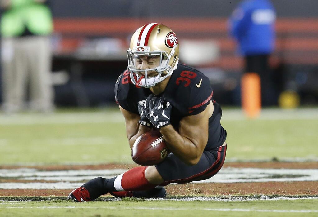 San Francisco 49ers' Jarryd Hayne (38) fumbles a punt that was recovered by the Minnesota Vikings during the first half of an NFL football game in Santa Clara, Calif., Monday, Sept. 14, 2015. (AP Photo/Tony Avelar)