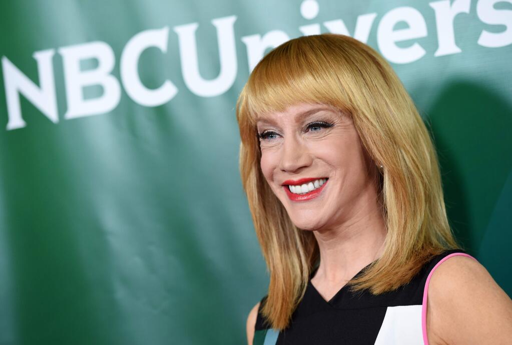 FILE - In this Thursday, Jan. 15, 2015, file photo, Kathy Griffin of the E! show 'Fashion Police' poses at the NBCUniversal Cable 2015 Winter TCA Press Tour at The Langham Huntington Hotel, in Pasadena, Calif. Griffin announced her departure from the E! program 'Fashion Police,' Thursday, March 12, in a posting on her Twitter account, which was verified by her office. (Photo by Chris Pizzello/Invision/AP, File)