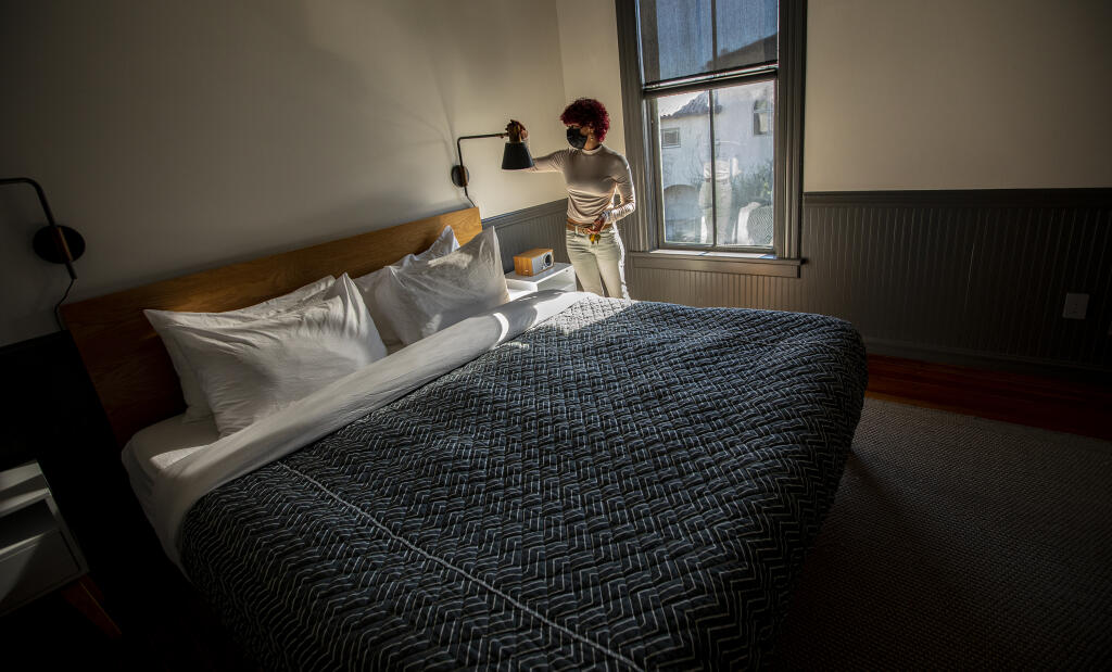 Hotel Thatcher’s Hospitality Manager Ada Souffront prepares rooms for guests arrivals in Hopland, Thursday February 10, 2022. (Chad Surmick / The Press Democrat)