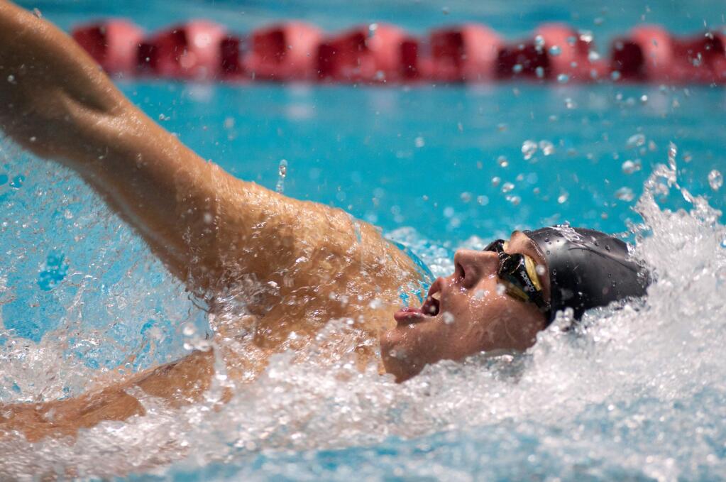 Analy graduate and USC varsity swimmer Jon Knox competes in the backstroke for the Trojans at the Texas Invitational in December. (USC Sports Information)