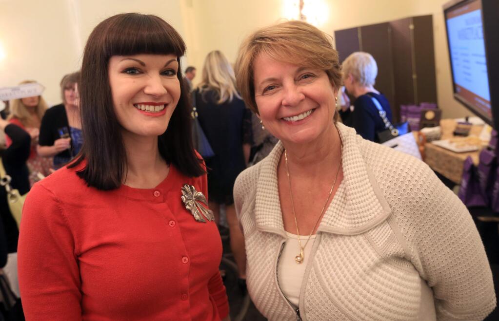 Angelina Knop and Debbie Meekins during YWCA's Women, Wine and Cheese fundraising event at the Fairmont Sonoma Mission and Spa Friday April 24, 2015 pin Sonoma. Kent Porter / Press Democrat) 2015