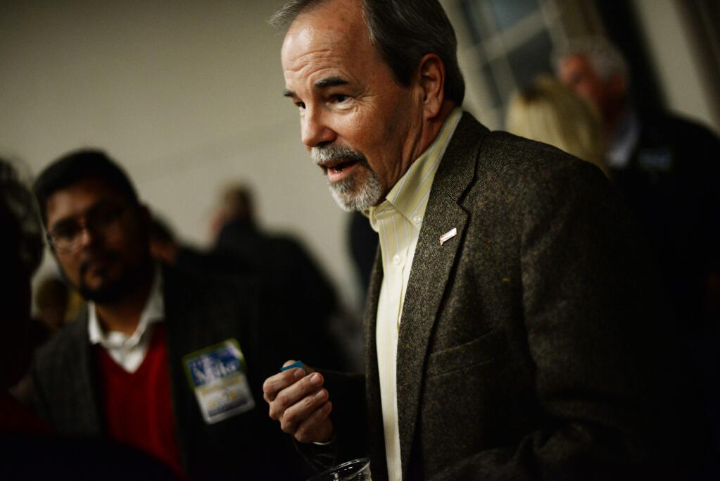 Santa Rosa Mayor Chris Coursey chatting with attendees during the Sonoma County Democratic Party 29th Annual Crab Feed held at the Santa Rosa Veterans Memorial Building Friday, February 24, 2017.(Photo: Erik Castro/for The Press Democrat)