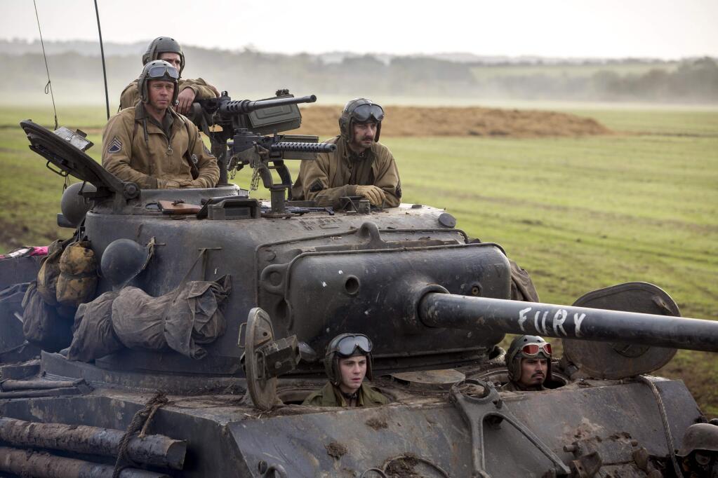 Sony PicturesBrad Pitt, top left, as Sgt. 'Wardaddy' Collier, leads a tank crew during the last weeks of WWII in Europe in 'Fury.' Other members of the tank crew are Shia LaBeouf, Logan Lerman, Michael Peña and Jon Bernthal.