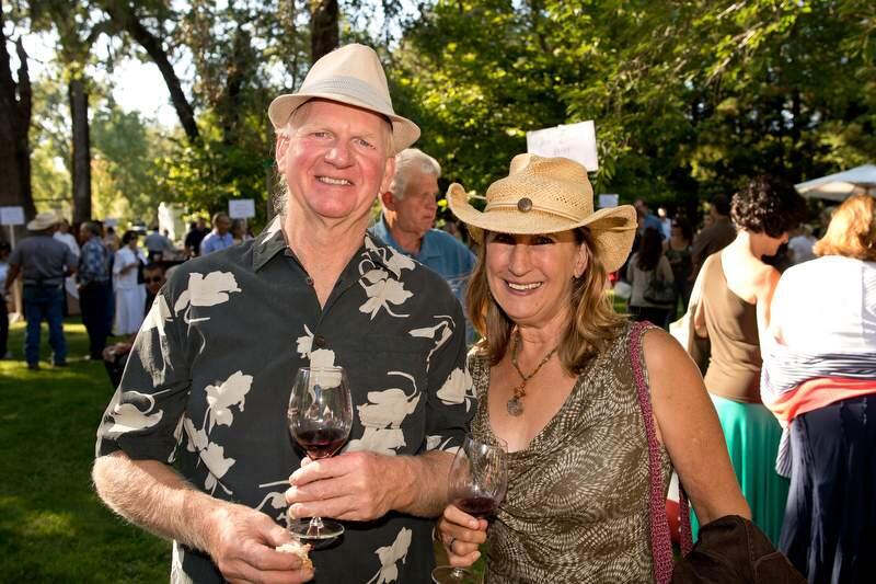 Windsor Town Councilmember Sam Salmon, left, and Wendy Nicholson attend Sonoma County Farm Bureau's Love of the Land gala at Richard's Grove & Saralee's Vineyard in Windsor, Calif., on July 18, 2013. (Alvin Jornada / For The Press Democrat)
