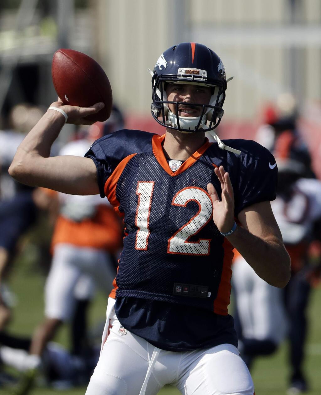 Denver Broncos quarterback Paxton Lynch throws during a joint NFL football practice with the San Francisco 49ers Wednesday, Aug. 16, 2017, in Santa Clara, Calif. (AP Photo/Marcio Jose Sanchez)