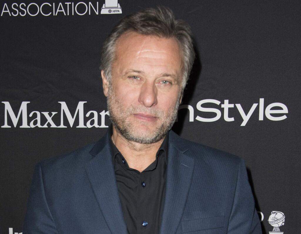 FILE - In this Sept. 12, 2015 file photo, Swedish actor Michael Nyqvist attends The Hollywood Foreign Press Association (HFPA) and InStyle's annual Toronto International Film Festival celebration in Toronto. Nyqvist, who starred in the original “The Girl With the Dragon Tattoo” films and often played villains in Hollywood movies like “John Wick” died after a year-long battle with lung cancer. He was 56. (Photo by Arthur Mola/Invision/AP, File)