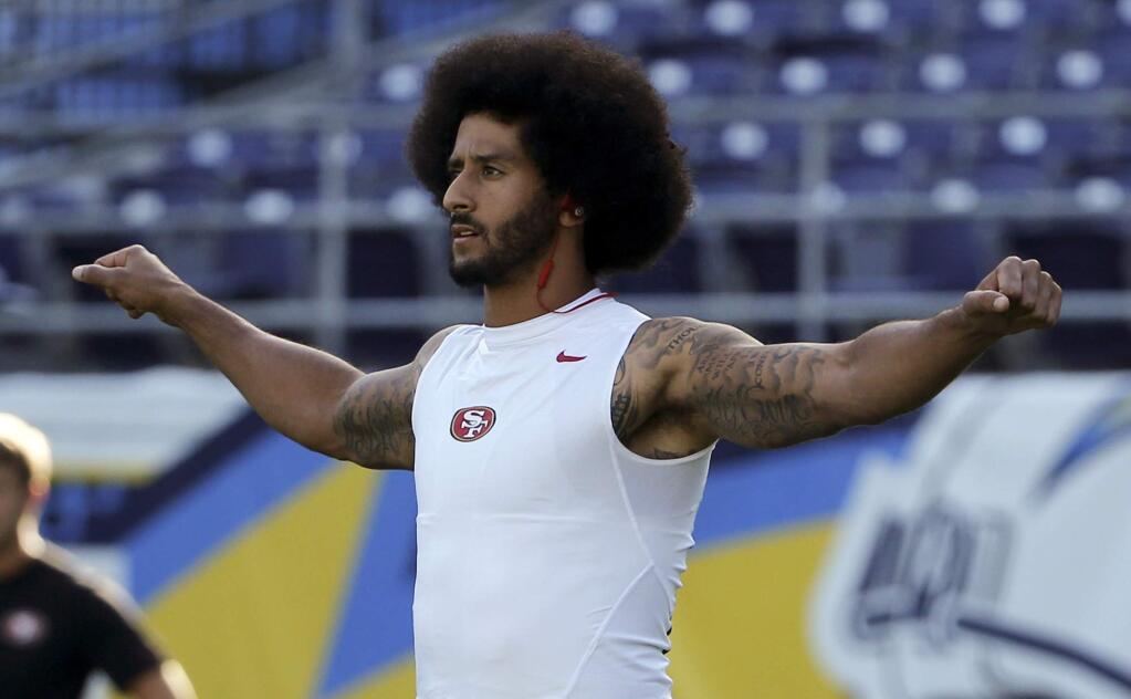 San Francisco 49ers quarterback Colin Kaepernick warms up before the team's NFL preseason football game against the San Diego Chargers, Thursday, Sept. 1, 2016, in San Diego. (AP Photo/Lenny Ignelzi)