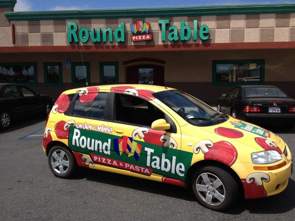 The Round Table Pizza chain was sold to an Atlanta-based franchise group Sept. 15, 2017. (SCS Wraps)