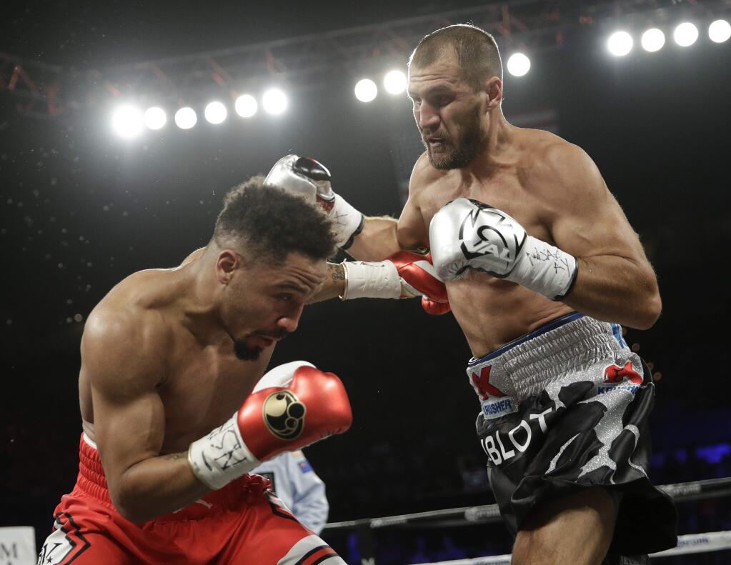 Sergey Kovalev, right, fights Andre Ward during a light heavyweight championship boxing match Saturday, June 17, 2017, in Las Vegas. (AP Photo/John Locher)