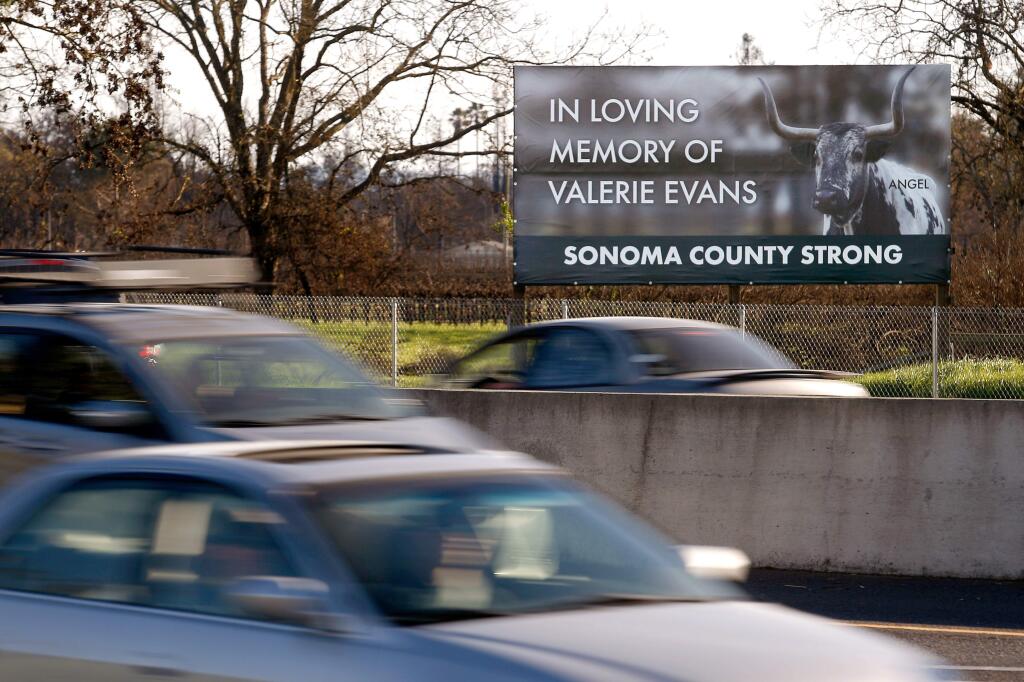 A billboard alongside southbound Highway 101 remembering Valerie Evans, who died in the Tubbs fire in Santa Rosa, California on Saturday, Feb. 10, 2018. (ALVIN JORNADA/ PD)