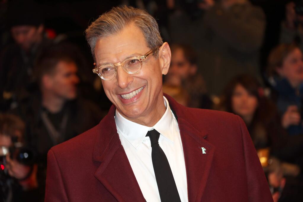 FILE - This Feb. 6, 2014 file photo shows actor Jeff Goldblum at the screening of the film The Grand Budapest Hotel and opening night of the 64th Berlinale International Film Festival in Berlin. The Cafe Carlyle said that the 'Jurassic Park' star will perform Sept. 16ñ20 with his jazz band, The Mildred Snitzer Orchestra. The actor has sung and played piano with the band for years but the new dates mark their New York premier. (Photo by Joel Ryan/Invision/AP, File)