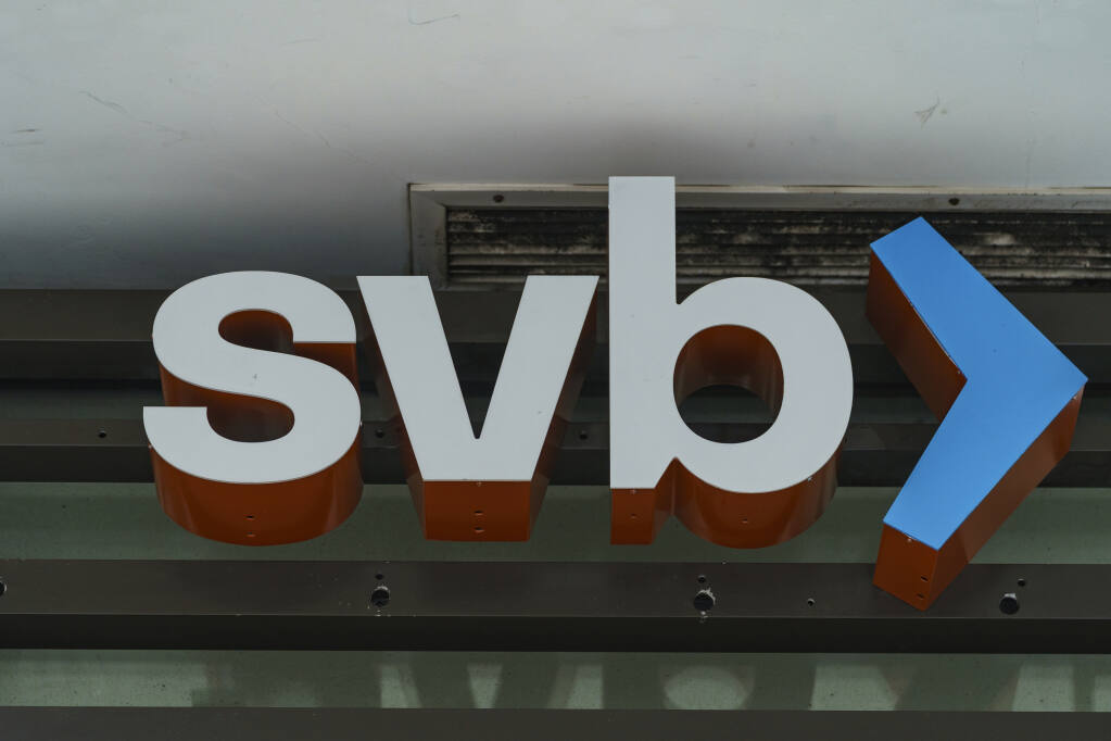 FILE - The Silicon Valley Bank logo is seen at an open branch in Pasadena, Calif., on March 13, 2023. The Federal Deposit Insurance Corp. says First Citizens will acquire much of Silicon Valley Bank, whose collapse has rattled the banking industry (AP Photo/Damian Dovarganes, File)