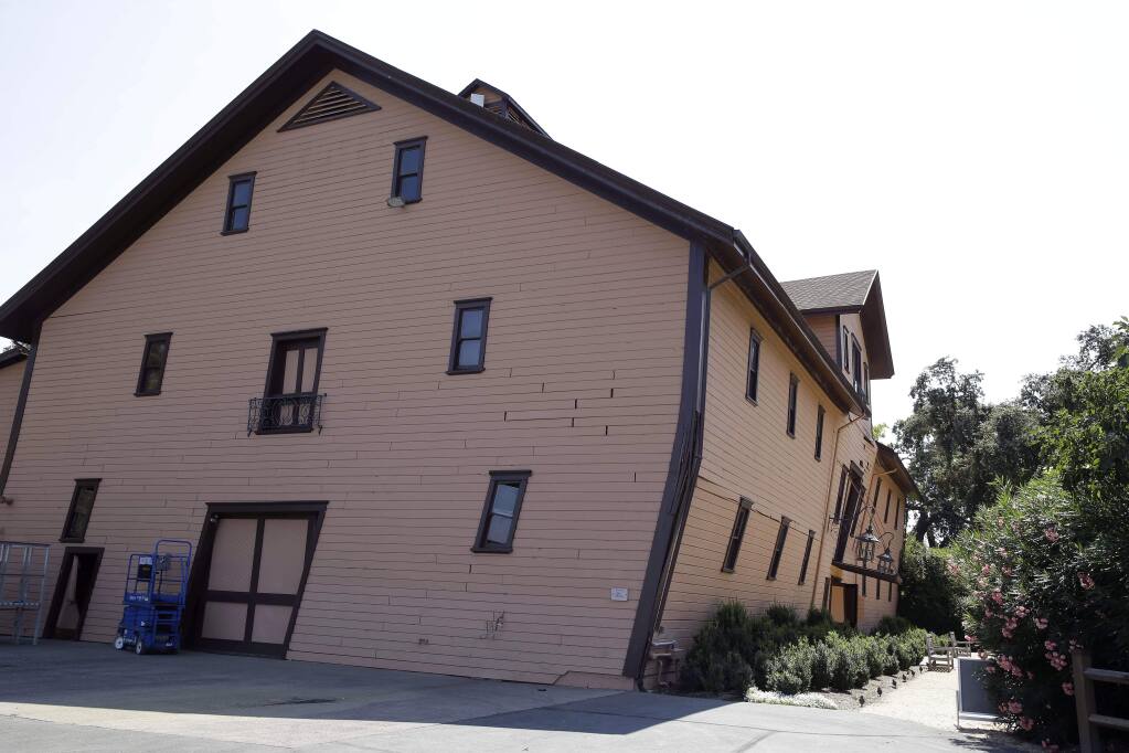 The earthquake-damaged historic winery building dating from 1886 at Trefethen Family Vineyards leans Monday, Aug. 25, 2014, in Napa, Calif. The winery hopes to save the building that is in danger of collapse after San Francisco Bay Area's strongest earthquake in 25 years struck the heart of California's wine country early Sunday. (AP Photo/Eric Risberg)