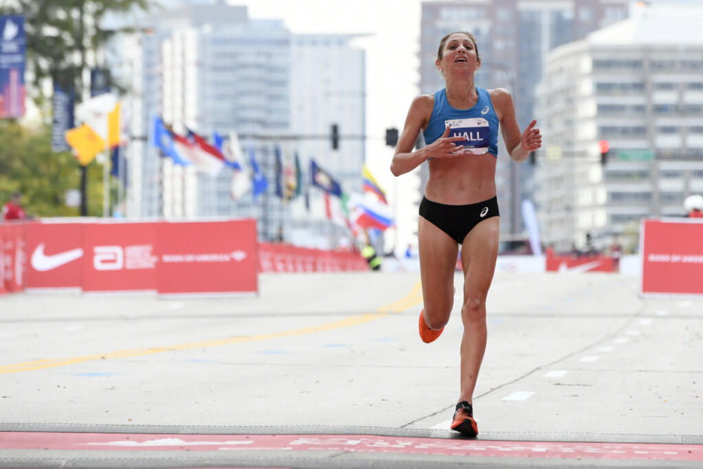 Sara Hall finishes third place in the Women's 2021 Bank of America Chicago Marathon Sunday, Oct. 10, 2021, in Chicago. Hall, a Montgomery High School grad, broke the American record for the half marathon in Houston Sunday. (AP Photo/Paul Beaty)