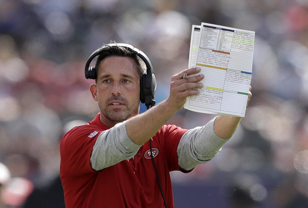 San Francisco 49ers head coach Kyle Shanahan gestures during the first half of an NFL football game against the Los Angeles Chargers, Sunday, Sept. 30, 2018, in Carson, Calif. (AP Photo/Marcio Sanchez)