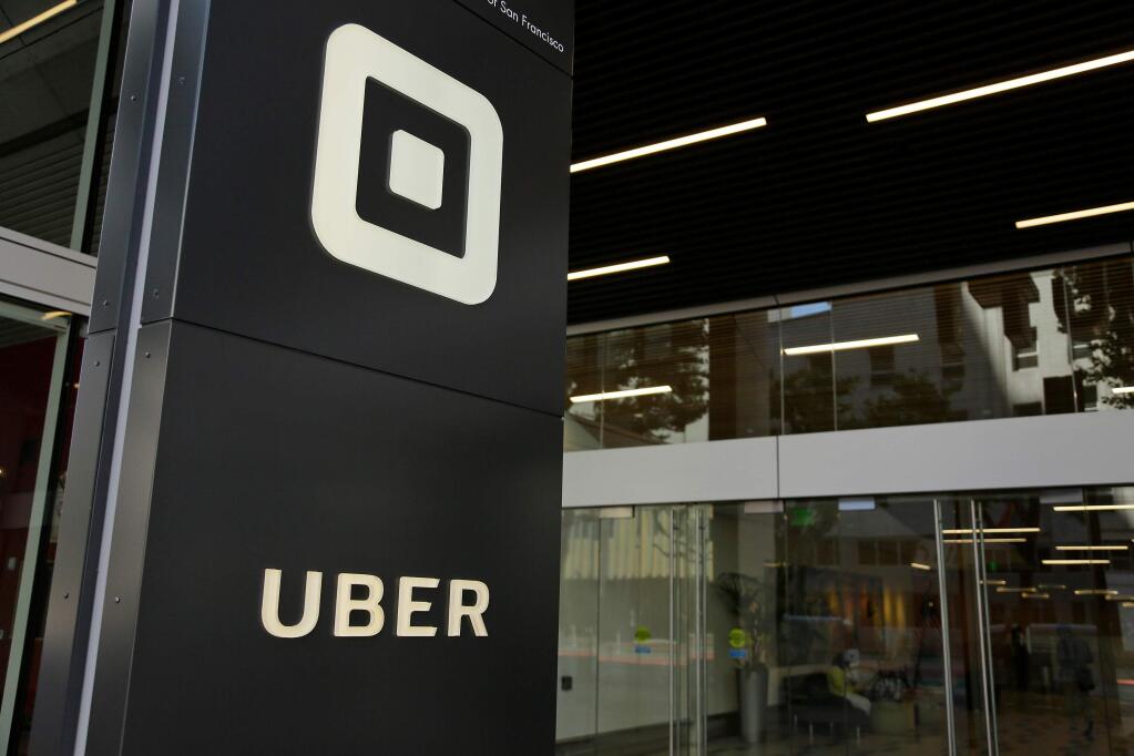 FILE - This June 21, 2017, file photo shows the building that houses the headquarters of Uber, in San Francisco. (AP Photo/Eric Risberg, File)