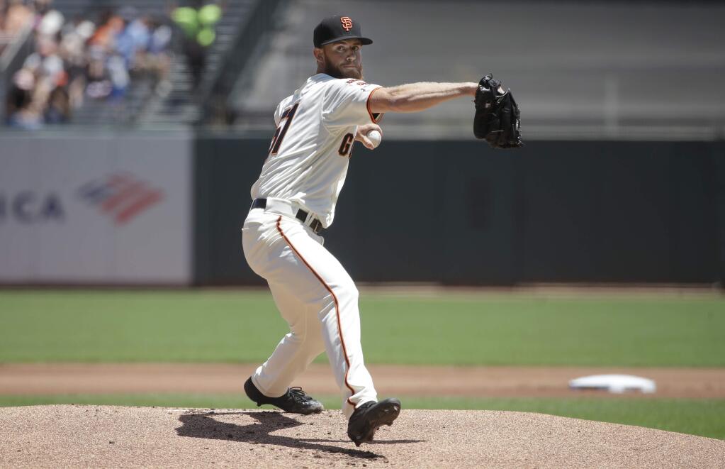 San Francisco Giants pitcher Conner Menez throws to a New York Mets batter during the first inning of a baseball game in San Francisco, Sunday, July 21, 2019. (AP Photo/Jeff Chiu)