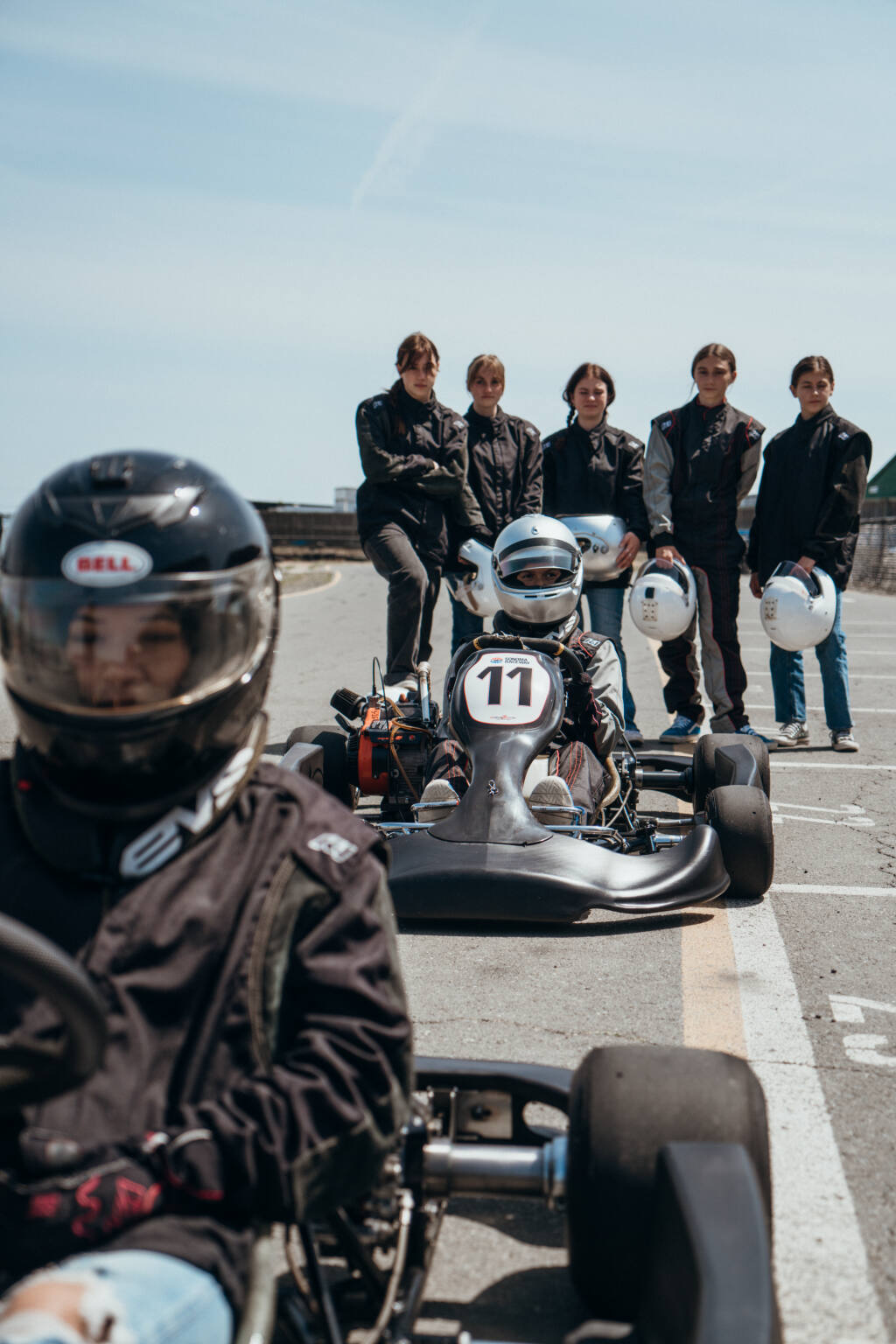 Girls gather on the Sonoma Raceway track as a part of Della Penna Motorsports Next Gen Foundation’s inaugural Sonoma event in April 2022. The foundation’s mission is to get more girl interested in motor sports and give them opportunities to break into the male-dominated industry. (Submitted)