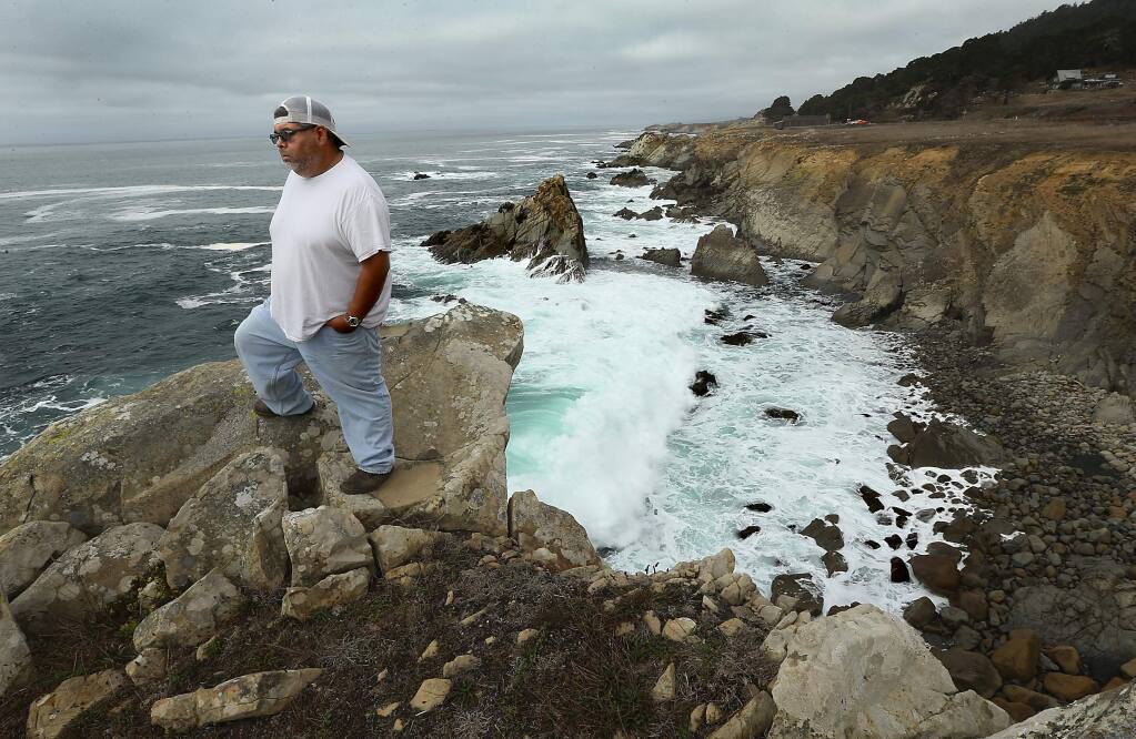 JOHN BURGESS / The Press Democrat RETURN TO ROOTS: Randy Marrufo, transportation planner for the Kashia Band of Pomo Indians, stands on a stretch of coastline at the northern edge of Salt Point State Park that is being acquired by a group of private and public agencies and will be transferred to the Kashia, restoring the tribe's ancestral lands.