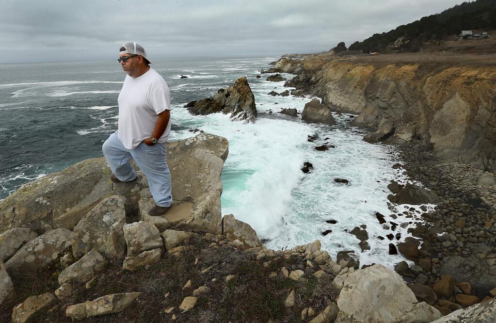 JOHN BURGESS / The Press Democrat RETURN TO ROOTS: Randy Marrufo, transportation planner for the Kashia Band of Pomo Indians, stands on a stretch of coastline at the northern edge of Salt Point State Park that is being acquired by a group of private and public agencies and will be transferred to the Kashia, restoring the tribe's ancestral lands.