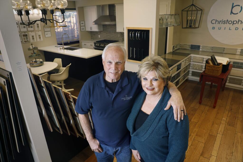 Brenda and Keith Christopherson of Christopherson Builders stand in a showroom of interior finishes at their design studio in Santa Rosa on Tuesday, January 22, 2019. (BETH SCHLANKER/ The Press Democrat)