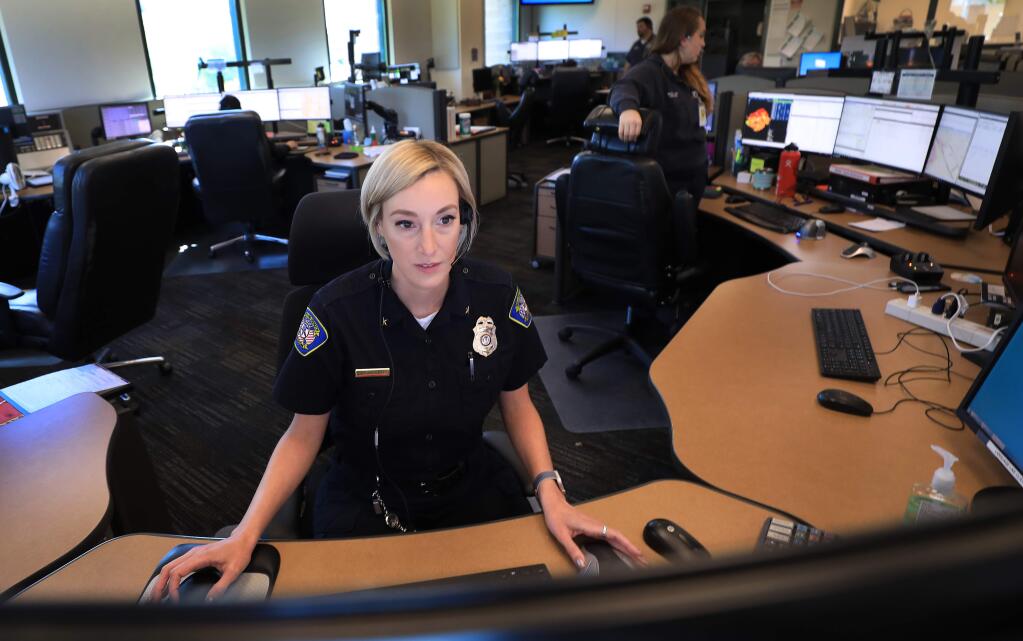 Katerine (KT) McNulty, a dispatch operations manager for the Redwood Empire Dispatch Communications Authority (Redcom) in Santa Rosa, has been named Dispatcher of the Year for her service during the 2017 wildfires, Friday, May 10, 2019. (Kent Porter / The Press Democrat)