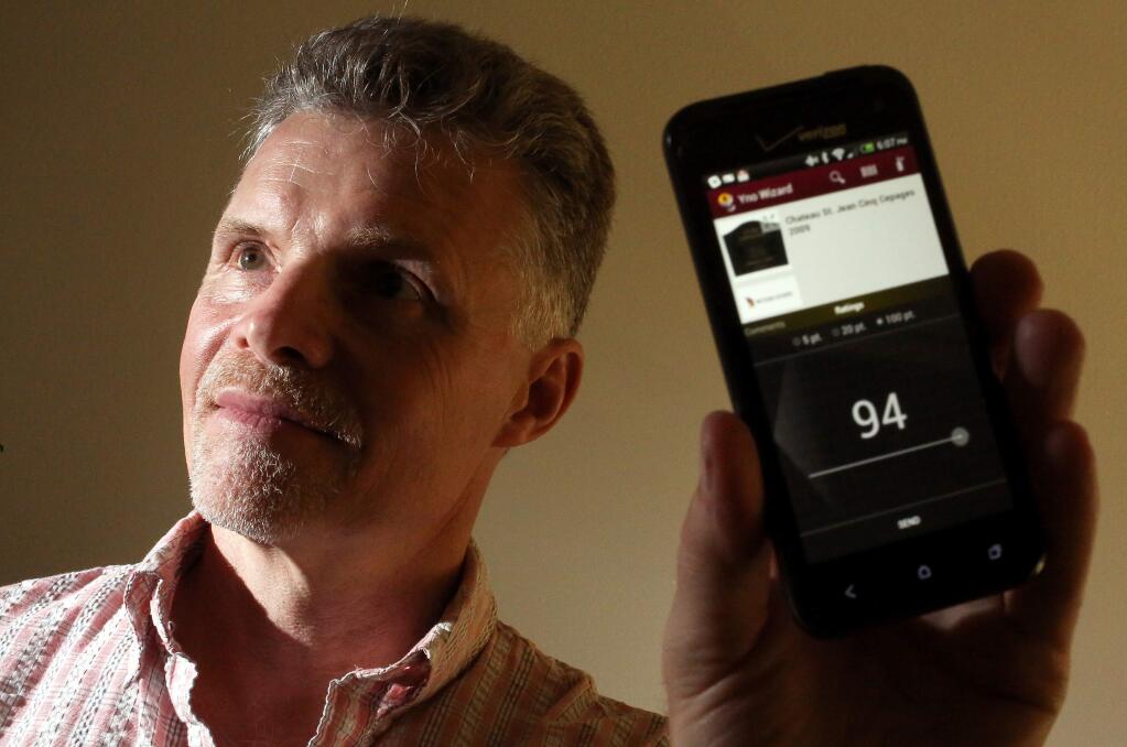 Bill Langley developed the Yno Wizard app for the Android system, which allows users to find descriptions, prices and reviews for wine.(Christopher Chung/ The Press Democrat)