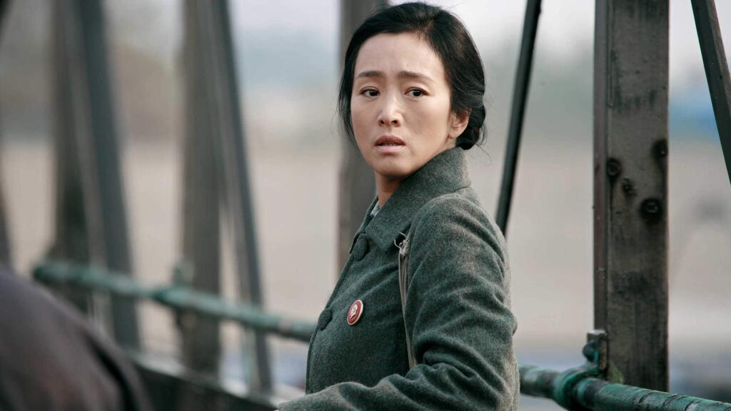Sony Pictures ClassicsFeng Wanyu (Gong Li) is a woman whose husband Lu is released after being sent to a labor camp as a political prisoner during China's harsh cultural revolution (1966-76) in 'Coming Home.'