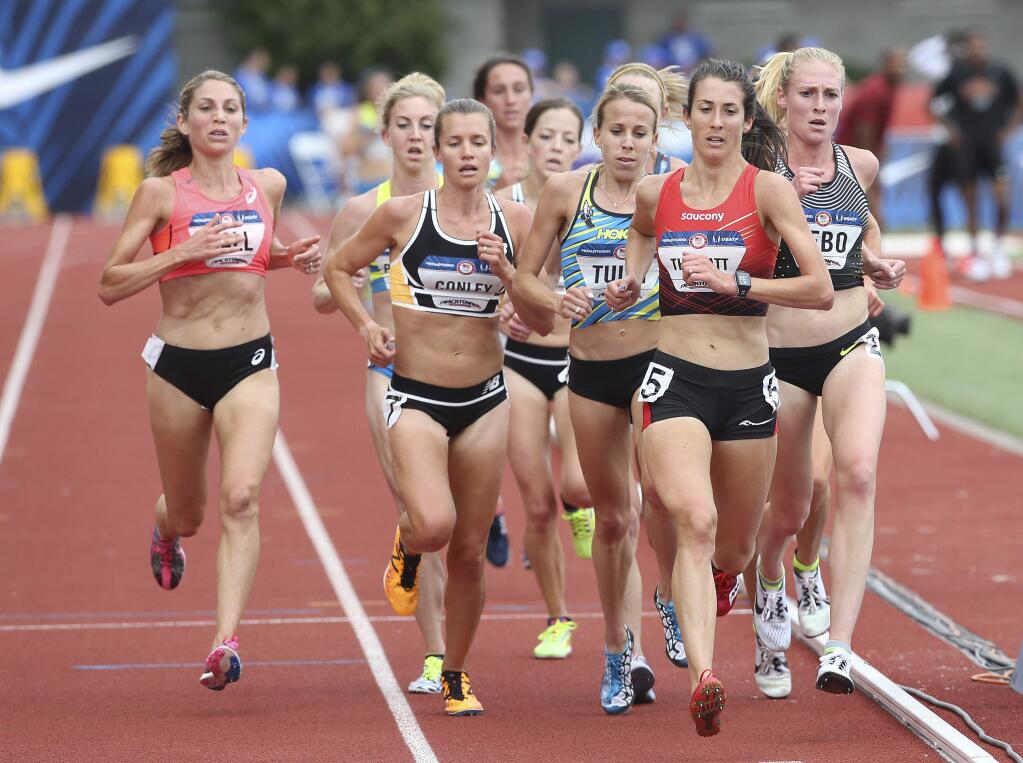 Sara Hall, left, and Kim Conley, third from left, race in the first heat of the Women's 5000 meters at the 2016 U.S. Olympic Track and Field Trials at Hayward Field in Eugene, Ore., on Thursday, July 7, 2016. (Kelly Lyon/The Register-Guard)