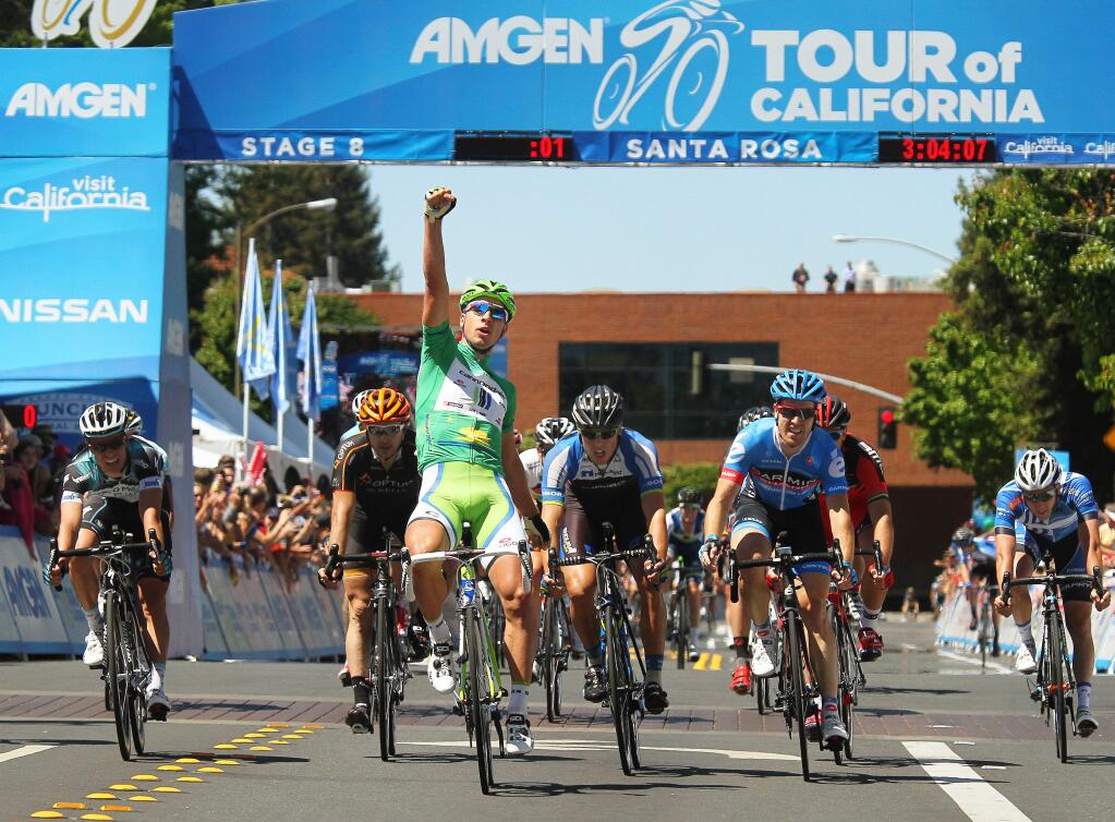 Peter Sagan lifts a fist triumphantly after winning the final stage of the 2013 Amgen Tour of California in Santa Rosa on Sunday, May 19, 2013. (Conner Jay/The Press Democrat)