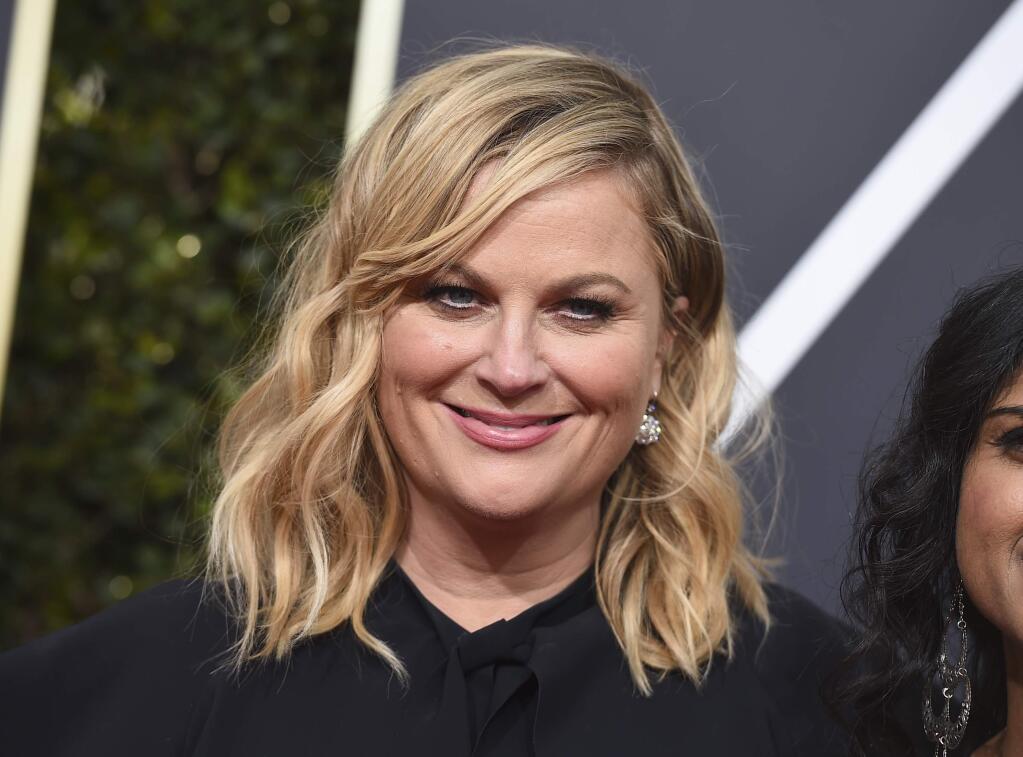Amy Poehler arrives at the 75th annual Golden Globe Awards at the Beverly Hilton Hotel on Sunday, Jan. 7, 2018, in Beverly Hills, Calif. (Photo by Jordan Strauss/Invision/AP)
