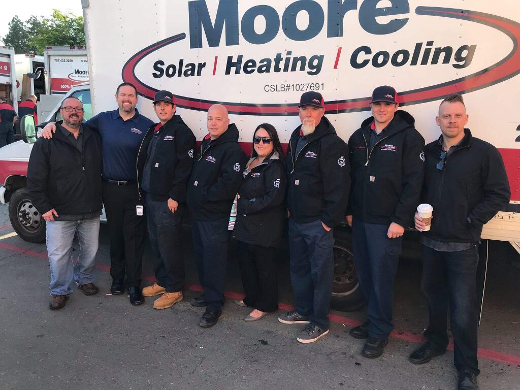 The longtimers of Moore Solar / Heating / Cooling, founded in 2009, from left, are Jonathan Wintersteller, co-owner Jon Diamond, Rich Cureton, Dale Wheeler, Melissa Cheney, Barry 'Coach' Roberts, Steve Herrick and co-owner Curtis Moore. (FACEBOOK) May 21, 2018