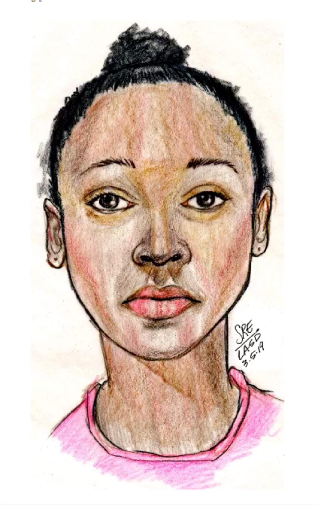 This sketch provided by the Los Angeles County Sheriff's Department shows a young girl whose body was found along a Southern California hiking trail, as they seek the public's help in identifying her. The child is believed to be between 8 and 13 years old. The body was discovered partially inside a duffel bag Tuesday morning, March 5, 2019, by workers landscaping a trail in Hacienda Heights southeast of Los Angeles. There's no immediate word on the cause of death but homicide detectives are investigating. (Los Angeles County Sheriff's Department via AP)