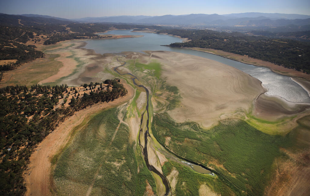 Lake Mendocino continues to recede, approaching levels not seen since 1976-77, Wednesday, Aug. 25, 2021. In the foreground is the east fork of the Russian River. (Kent Porter / The Press Democrat)