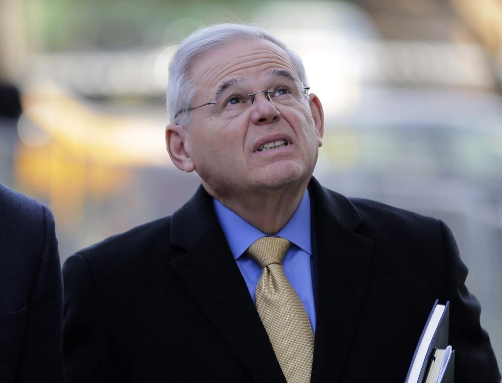 New Jersey Senator Bob Menendez arrives to the federal courthouse in Newark, N.J., Tuesday, Nov. 14, 2017. Jurors in Menendez's bribery trial remained deadlocked Tuesday after a judge told them to 'take as much time as you need' to reach a verdict on 18 counts against the New Jersey Democrat and his wealthy friend. (AP Photo/Seth Wenig)