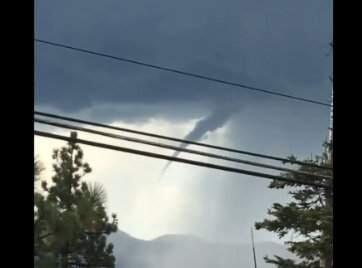The Reno weather office says the waterspout made contact with the lake at 4:27 p.m. Wednesday and numerous spotter photos show its well-defined spray ring on the surface. (VIDEO SCREENSHOT)