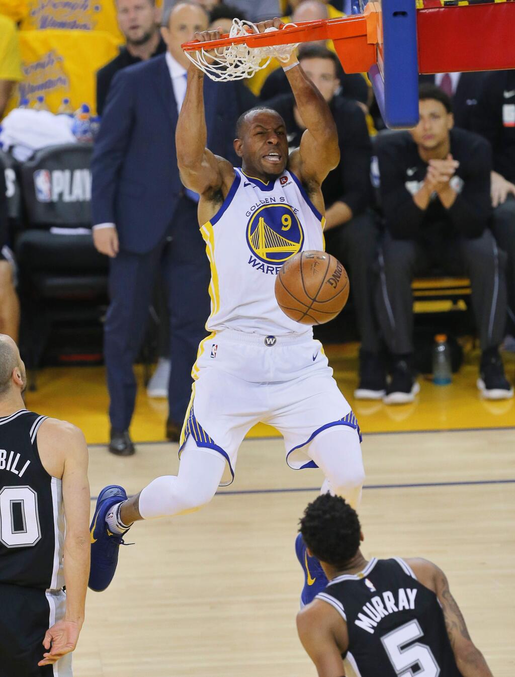 Golden State Warriors guard Andre Iguodala slams the ball down against the San Antonio Spurs, during their game in Oakland on Tuesday, April 24, 2018. (Christopher Chung/ The Press Democrat)