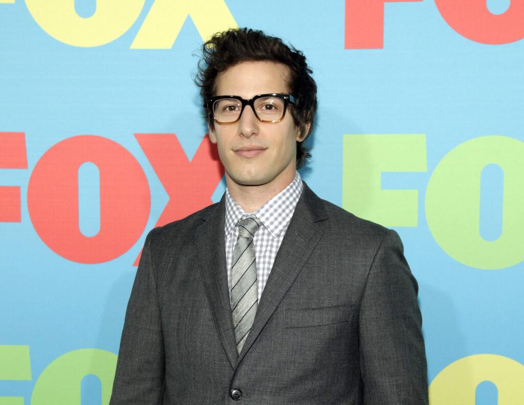 FILE - In this May 12, 2014 file photo, actor Andy Samberg attends the FOX Network 2014 Upfront event, in New York. Samberg is taking center stage at the Emmy Awards. Fox said Thursday, March 12, 2015, that Samberg, star of the network's sitcom 'Brooklyn Nine-Nine,' will host the September ceremony. (Photo by Andy Kropa/Invision/AP, File)