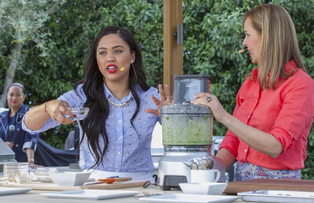 Lifestyle blogger Ayesha Curry, wife of Golden State Warriors guard and NBA MVP Stephen Curry, and Culinary Director of Williams S-Sonoma Amanda Haas, demonstrate sauce making at the new test kitchen. Sunset magazine celebrated its newly-opened kitchen and gardens at Cornerstone Sonoma on Saturday and Sunday, May 14 and 15. (Photos by Robbi Pengelly/Index-Tribune)